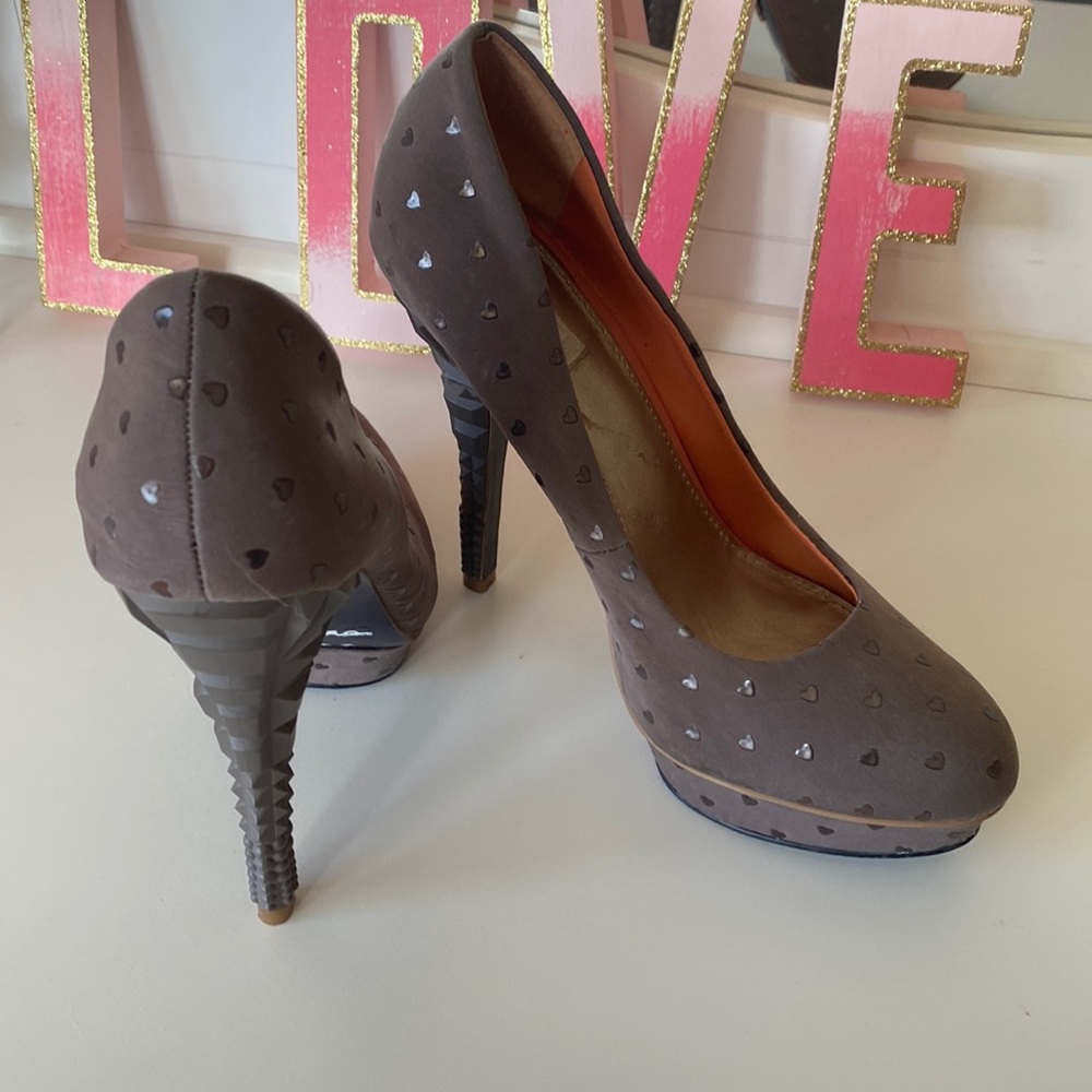 Rachel Roy stilettos plum colored w hearts and geo shaped heels, slightly worn
